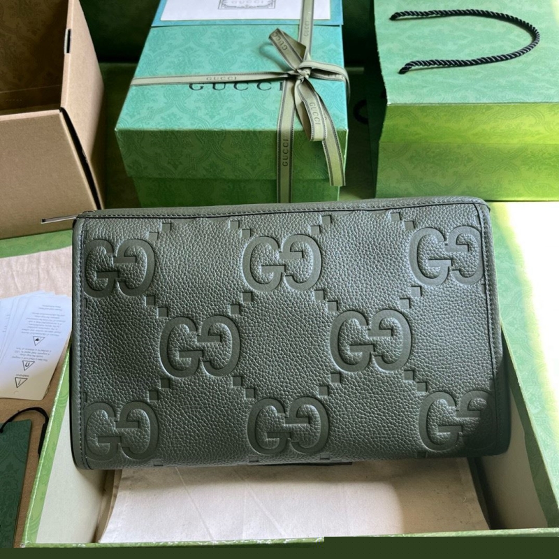 G*u*i clutch bags